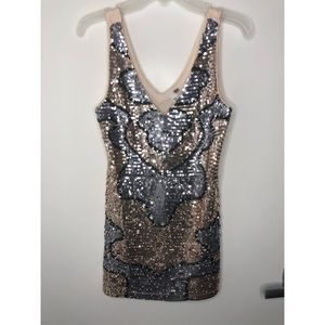 Blush top with silver and rose sequin.